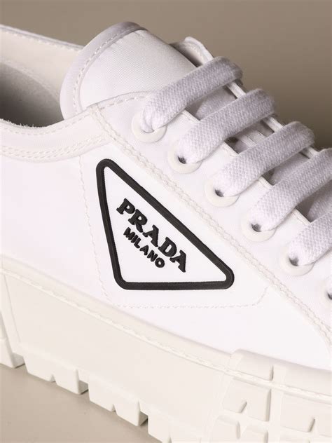 white sneakers prada|all white prada sneakers.